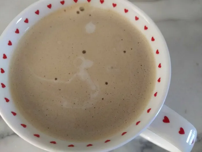 After I Poured Milk Into My Coffee, I Found Snoopy On The Doghouse Under The Moon