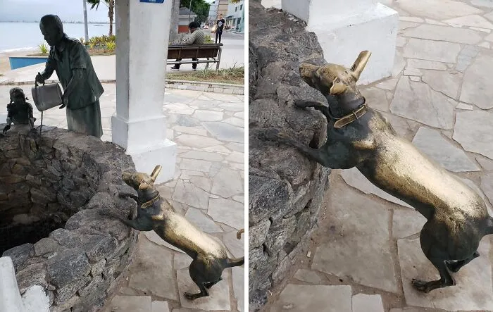 Esta estatua de perro está desgastada de tanto acariciarla