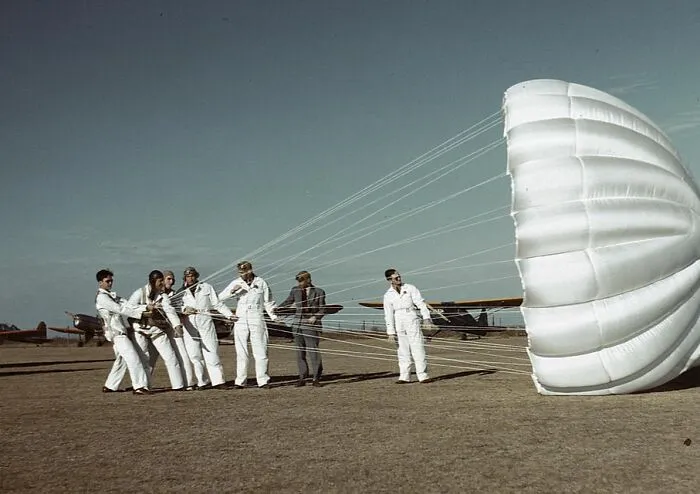 Instructor Explaining The Operation Of A Parachute To Student Pilots, Meacham Field, Fort Worth, Tex., 1942 Jan