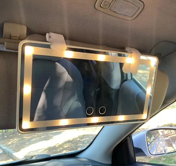 Get Ready For A Glow-Up (Literally) With The <a Style="Display:inline;" Href="Https://Www.amazon.com/Vanity-Cosmetic-Battery-Rechargeable-Dimmable/Dp/B08yqxy7cz?ie=utf8&th=1&linkcode=ll1&tag=bpmonkey-20&linkid=85dbf23689ae84f1e65a5ee8f5b47a3b&language=en_us&ref_=as_li_ss_tl" Target="_blank"><span Style="Font: Inherit; Color: #d74b1f;"> Sunvisor Vanity Mirror With Lights </Span>, Because Who Doesn't Need A Little Extra Illumination To Slay The Day?