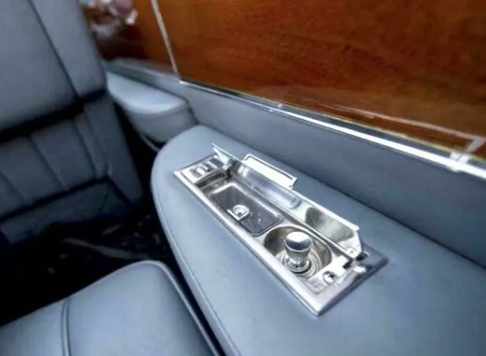 Back When Sedans Had Ashtrays With Lighters For The Backseat Passengers