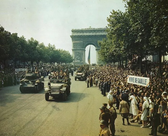 Crowds Of French Patriots Line The Champs Elysees To View Allied Tanks And Half Tracks Pass Through The Arc Du Triomphe, After Paris Was Liberated On August 25, 1944, 1944 Aug. 26