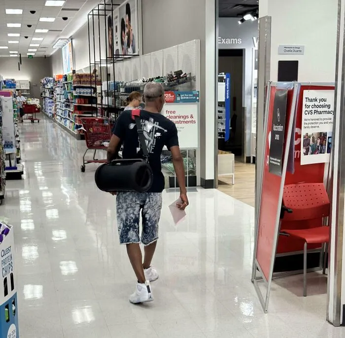 That Is A Huge Bluetooth Speaker On His Back. Yes, There Is Music Coming Out Of It