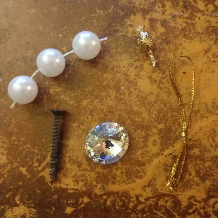 A Friend Nursed An Injured Crow Back To Health After It Got Trapped In Her French Quarter Courtyard. These As Some Of The Things The Crow Has Been Bringing Her As Apparent Gifts