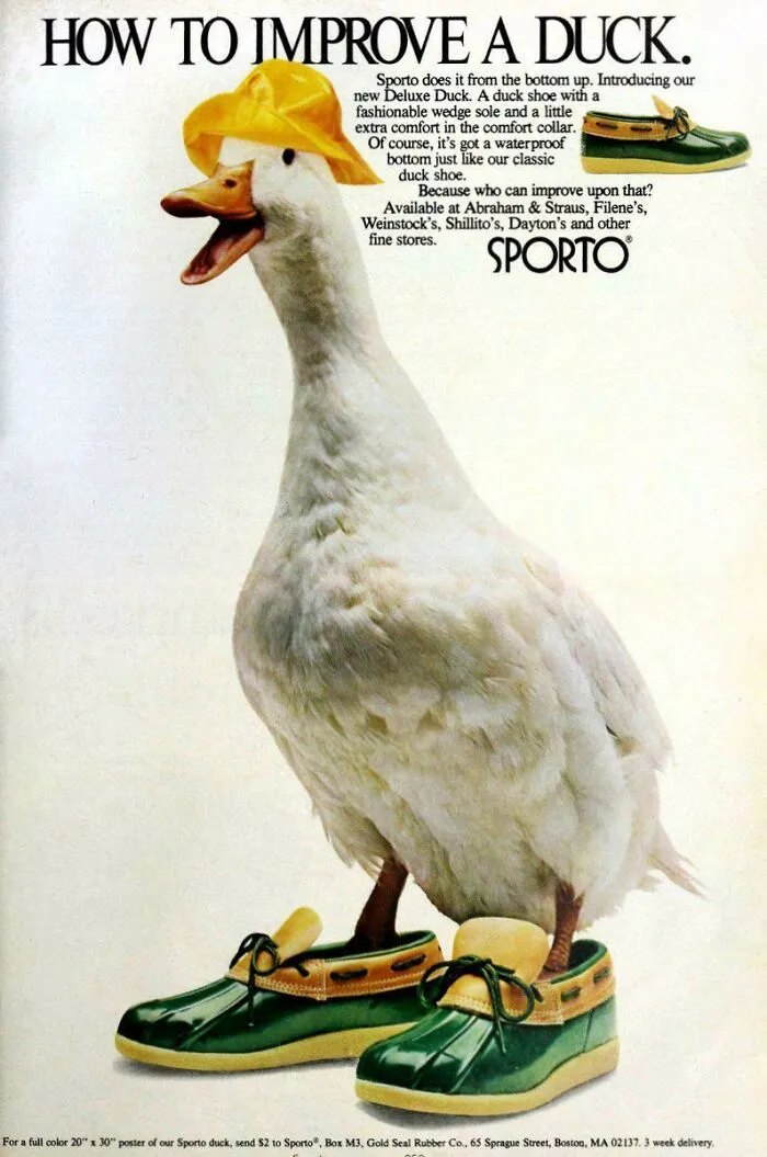 Duck wearing a yellow hat and green shoes, showcasing quirky 80s fashion trends in an advertisement.