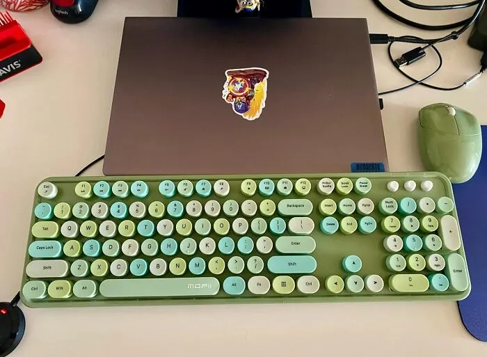 <a style="display:inline;" href="https://www.amazon.com/Wireless-Dropout-Free-Connection-Compatible-Blue-Colorful/dp/B08N4B8Z1J?ie=UTF8&th=1&linkCode=ll1&tag=bpdeer-20&linkId=4ca4489da0f205962e1ed93e1b3c1f70&language=en_US&ref_=as_li_ss_tl " target="_blank"> "If you have a cat, a <span Style="Font:inherit;color:#d74b1f;"> wireless keyboard </Span> is a life saver so that you can turn it off when the cat is all up on your business or when you leave your desk." - <span Style="Font:inherit;color:#808080"> KatAttack </Span>