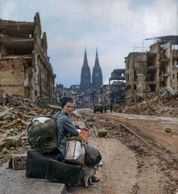 A Woman Sitting In The Ruins Of Cologne, Germany, 1945