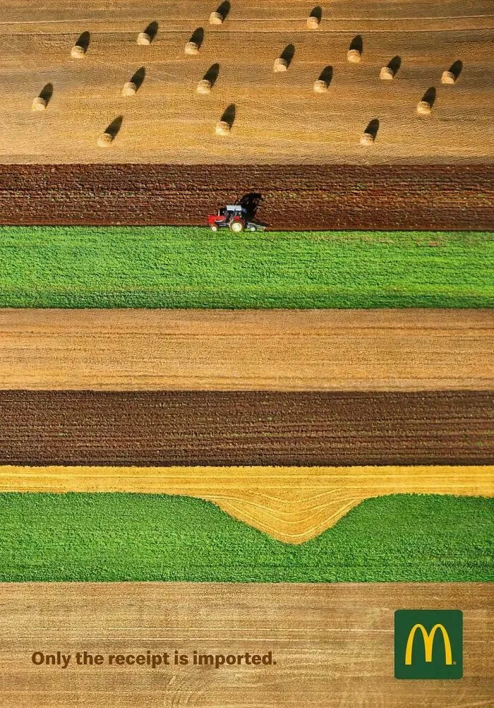 Aerial view of colorful farm fields with a tractor, showcasing smart and cool design agriculture innovation.