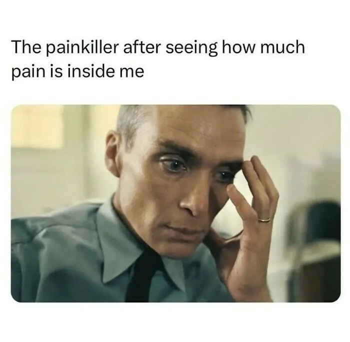 Man with distressed expression holding his head, illustrating the humor posts for people who use humor as a coping mechanism.