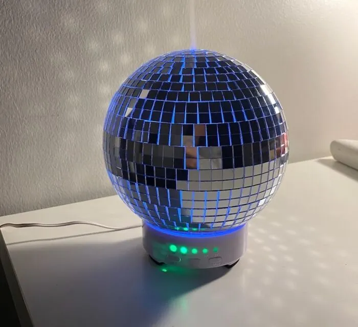 Add A Touch Of Studio 54 Glam To Your Workspace With This <a Style="Display:inline;" Href="Https://Www.amazon.com/Scandinordica-Disco-Ball-Diffuser-Aromatherapy/Dp/B0bn27gpr4?ie=utf8&th=1&linkcode=ll1&tag=bphawk-20&linkid=839196ba72c137b2af2bca503a9aa19d&language=en_us&ref_=as_li_ss_tl" Target="_blank"><span Style="Font: Inherit; Color: #d74b1f;"> Discoball Diffuser </Span>, A Funky And Functional Way To Light Up Your Office And Get The Party Started