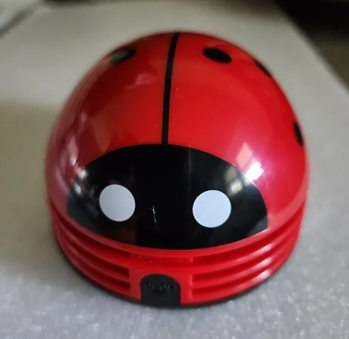 Sweep Your Desk Clean With A Smile With This <a Style="Display:inline;" Href="Https://Www.amazon.com/Portable-Ladybug-Cartoon-Desktop-Cleaner/Dp/B00r4iqq5o?ie=utf8&th=1&linkcode=ll1&tag=bphawk-20&linkid=7d7cb5f8e06b364fa5da0841f413cbab&language=en_us&ref_=as_li_ss_tl" Target="_blank"><span Style="Font: Inherit; Color: #d74b1f;"> Mini Desktop Vacuum </Span>, A Ladybug-Shaped Cutie That's As Functional As It Is Adorable