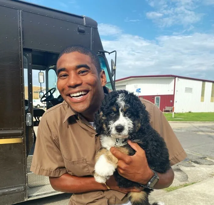 This UPS Driver's 21 New Photos With Pets Are The Dose Of Wholesome Content You Need