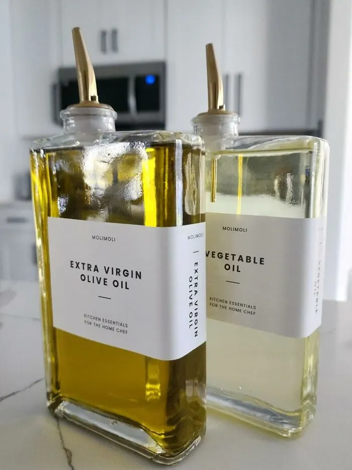 Elevate Your Kitchen Game With These Chic <a Style="Display:inline;" Href="Https://Www.amazon.com/Molimoli-Oil-Dispenser-Bottle-Automatic/Dp/B0bcnx6wsm?ie=utf8&th=1&linkcode=ll1&tag=bppanda-20&linkid=fda855171638f9e4a50091b50d80f016&language=en_us&ref_=as_li_ss_tl" Target="_blank"><span Style="Font: Inherit; Color: #d74b1f;"> Glass Olive Oil Dispensers</Span> That Are Pure Eye-Candy While Keeping Cooking Oils Organized And Ready To Pour