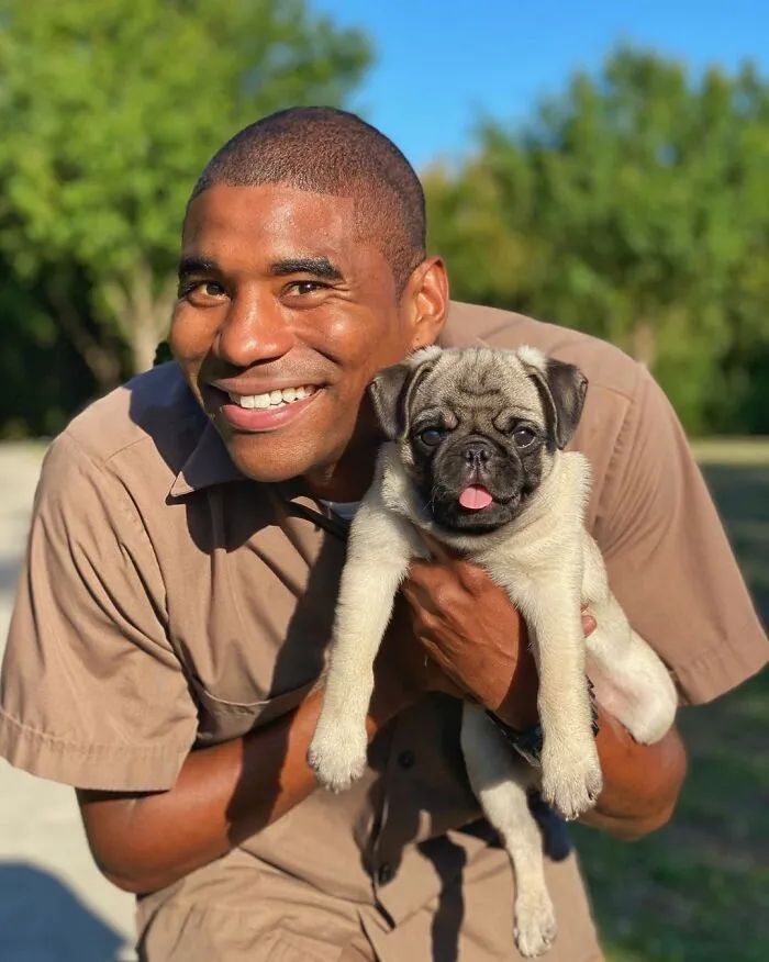 This UPS Driver's 21 New Photos With Pets Are The Dose Of Wholesome Content You Need