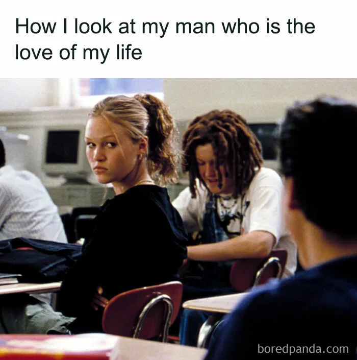 Woman giving a skeptical look in a classroom, humorous moment captured from "Moms Behaving Badly" account.