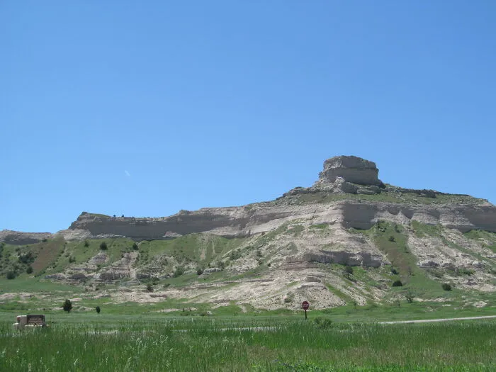 Scenic landscape showcasing amazing views of Scotts Bluff, Nebraska, under a clear blue sky.