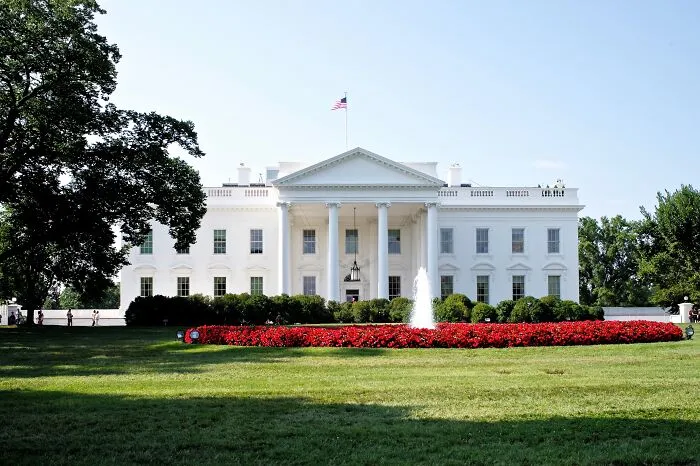 Historic White House lawn with vibrant garden, representing amazing views in the States.