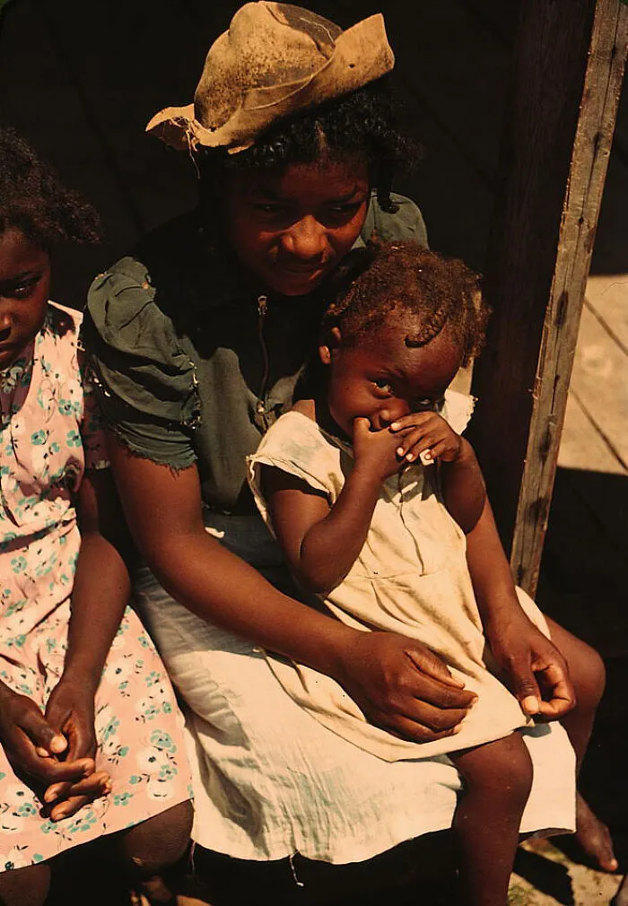 Bayou Bourbeau Plantation, A Farm Security Administration Cooperative, Vicinity Of Natchitoches, La. Three Children Sitting On The Porch Of A House, 1940 August