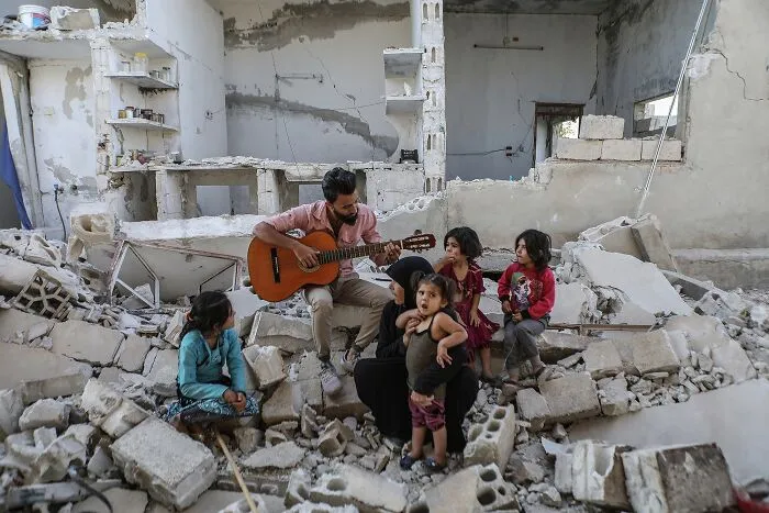 Amateur/Student Gold In People/Family, 1st Place Winner In People: "Peace In Times Of War" By Mouneb Taim