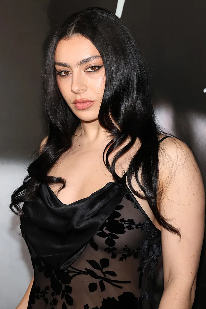 Charli XCX urges brands gifting her clothing to instead donate it to those affected by the blaze