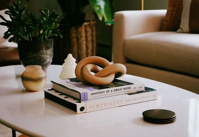 Instead Of Buying New Expensive Coffee Table Books, Get Them At A Thrift Store