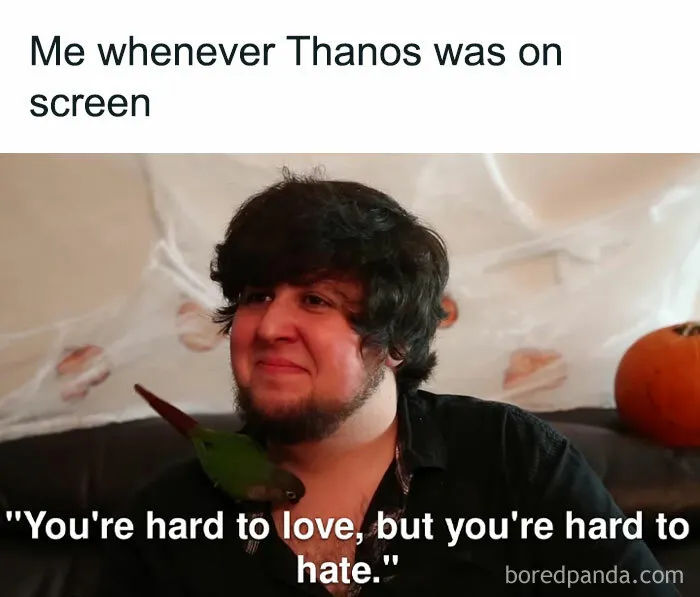 A person smiling with a parrot on their shoulder, captioned with a meme about Thanos; humorous Squid Game 2 meme.
