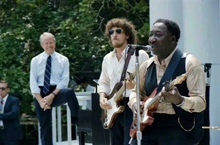 President Jimmy Carter Enjoying Some Muddy Waters At A White House Picnic In 1978
