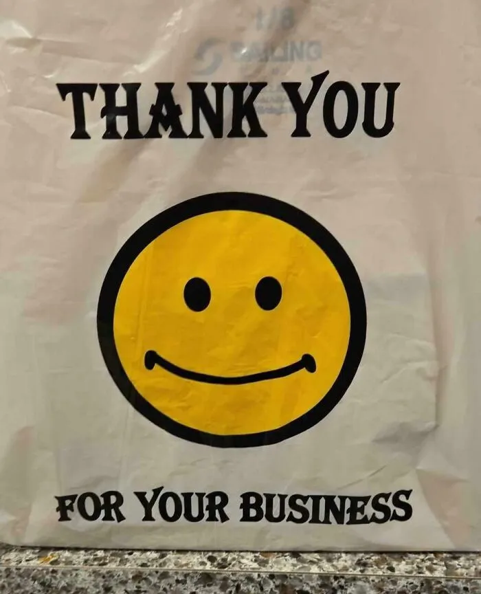 The Smiley Face On My Bag Looks Like He Is Barely Holding It Together