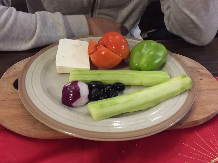 I Ordered A Salad And Got A Plate Of Random Ingredients On A Wooden Board