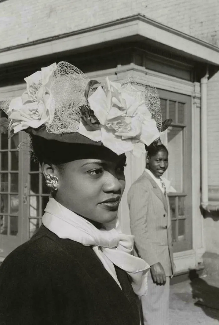 Unknown Lady Walking Down The Street In Harlem, NY, Late 1940s. A Men Stops And Looks At Her,