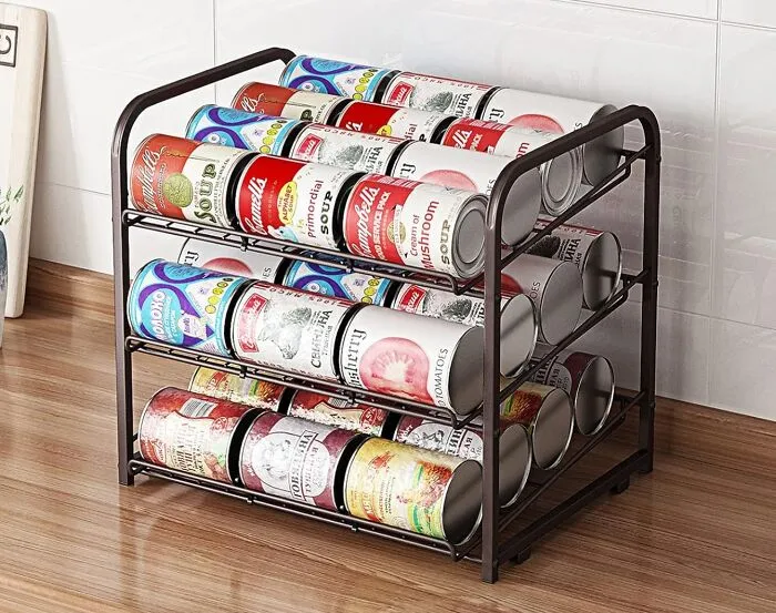 Can-Do Attitude Not Included, But This <a Style="Display:inline;" Href="Https://Www.amazon.com/Dp/B09185pgx5?th=1&linkcode=ll1&tag=bpalpaca-20&linkid=d7cc845a17ff0520407c74a589002645&language=en_us&ref_=as_li_ss_tl" Target="_blank"><span Style="Font: Inherit; Color: #d74b1f;"> 3-Tier Can Organiser</Span> Will At Least Keep Your Pantry From Looking Like A Hot Mess