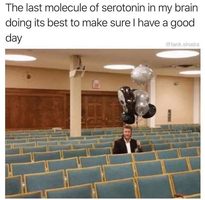 Man sitting alone in a large empty room holding balloons, illustrating humor as a coping mechanism in a relatable meme.