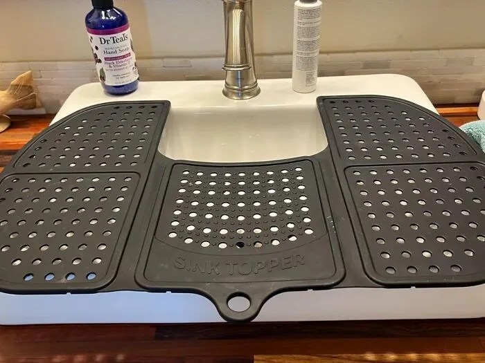 Cover Up The Clutter And Maximize Your Counter Space With A <a Style="Display:inline;" Href="Https://Www.amazon.com/Sink-Topper-Foldable-Bathroom-Organizer/Dp/B08zl7j9j9?ie=utf8&th=1&linkcode=ll1&tag=bptoucan-20&linkid=89b38f847740f2ba785a6d0a701dc2fc&language=en_us&ref_=as_li_ss_tl" Target="_blank"><span Style="Font: Inherit; Color: #d74b1f;"> Foldable Sink Cover</Span> That Turns Your Sink Into A Seamless Surface