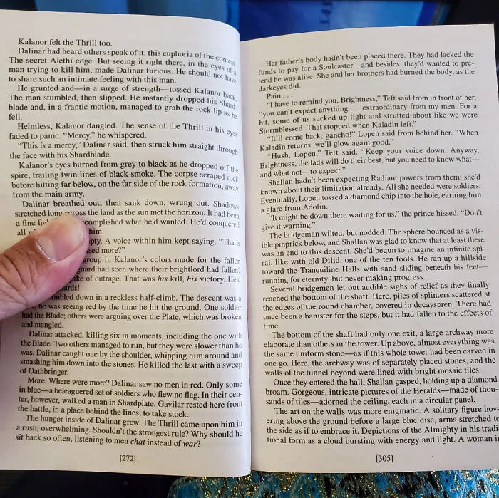 Open book pages showing text layout, illustrating poorly-written-designed-books concept in a casual reading setting.