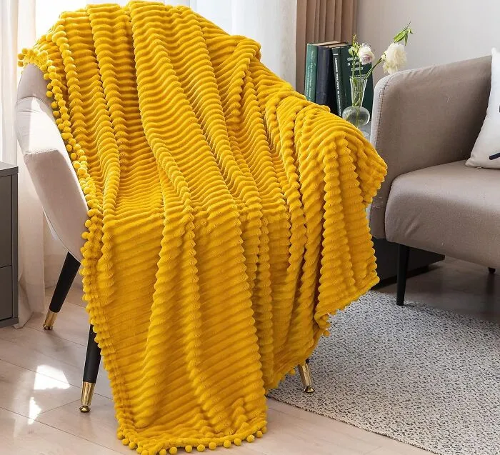 Snuggle Up With A Slice Of Sunshine - This Ridiculously Soft <a Style="Display:inline;" Href="Https://Www.amazon.com/Dissa-Flannel-Blanket-Pompom-Lightweight/Dp/B08r5jrxbw?crid=6eb8d61nvpum&dib=eyj2ijoimsj9.itargeoycot9xfqf1b4ubbgnkzd0o0_mq27oz3t8u7-Ltgki0i73vlq4c-Vdiytntqkkdjwjdibfgtevk7okcudiakwz42bzwzywcbdrkpgsriozqeyf6zhdeoufyw6umhawqig5bcfqfotz-81faczazum0jzgilsh7cd5egowfm36qnm3mfwylb3dwgsjnv7uiqyo6kec58iz-Qqxm59trlhy_xeatzsvyhby9xgcdbezfkichcgn8qqp3cux33m7pltbp0nsszbhtqchchi_tmcfwqf-Rriaqsy6jkics3j5fx_z12ptivc9bvbtjp0aiwtqbnuxnrvaxonz1du5s-Vnksqpj3eys1i4hjbijymigvfh30bpfxqbjhum_hshvcpwixqmpww3hdmhgrvpwdk1sixaxgm2-7oj__sgfeamwj-7zqxhxekv-D6kd.9rl9p2fmppqay2uvzle4cksk_xej52dhg_z-Hk-Zh4k&dib_tag=se&keywords=fun%2bblanket&qid=1739294464&sprefix=fun%2bblanke%2caps%2c251&sr=8-30&th=1&linkcode=ll1&tag=bpwoodpecker-20&linkid=18ba05009ec473929137361187994462&language=en_us&ref_=as_li_ss_tl" Target="_blank"><span Style="Font: Inherit; Color: #d74b1f;"> Yellow Fluffy Blanket With Pompom Details</Span> Is The Ultimate Mood-Booster For Your Home