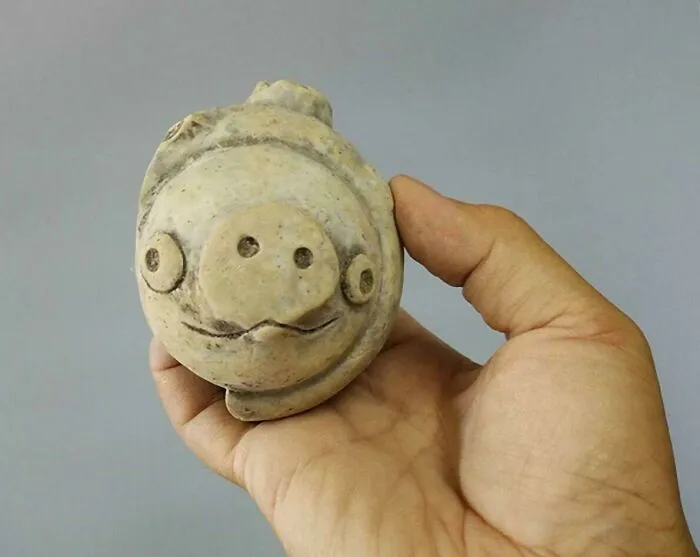 A 3,000-Year-Old Clay Pig Found In 2020 At The Lianhe Ruins In China. When It Was Discovered, The Pottery Has Gone Viral As It Looks Similar To The Pigs In Angry Birds