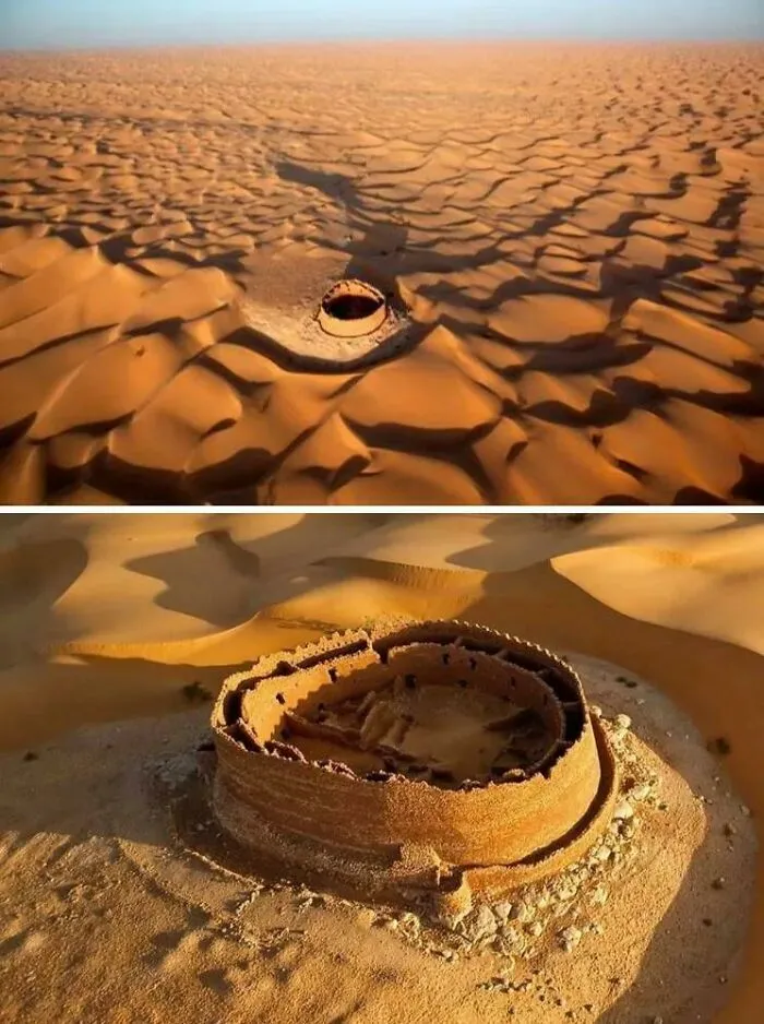 Ancient artefact ruins partially buried in sandy desert landscape, showcasing survival over centuries.
