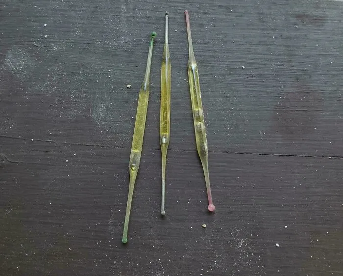 What Did I Find? Found Underneath A Bathroom Vanity During Remodeling. They Are Small About 2 Inches Long. Little Glass Tubes Filled With Liquid
