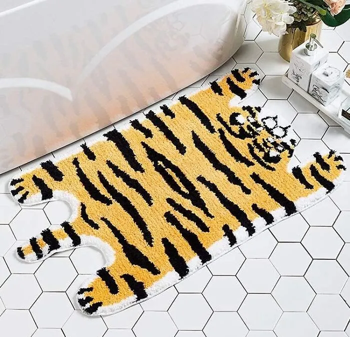 Unleash Your Wild Side With This <a Style="Display:inline;" Href="Https://Www.amazon.com/Dp/B089m47sgg?btn_ref=srctok-B4f38ecec7575517&ascsubtag=7741432%2c5%2c23%2cd%2c0%2c0%2c0%2c1396%3a1&900%3a2=undefined&974%3a3=undefined&1125%3a2=undefined&1338%3a1%2c54906682%2c0%2c0%2c0=undefined&th=1&linkcode=ll1&tag=bpmelon-20&linkid=26b034ee8c323140ee2289198fa12ae7&language=en_us&ref_=as_li_ss_tl" Target="_blank"><span Style="Font: Inherit; Color: #d74b1f;"> Tiger Mat</Span>, Because Your Bathroom Floor Deserves A Roaring Good Time