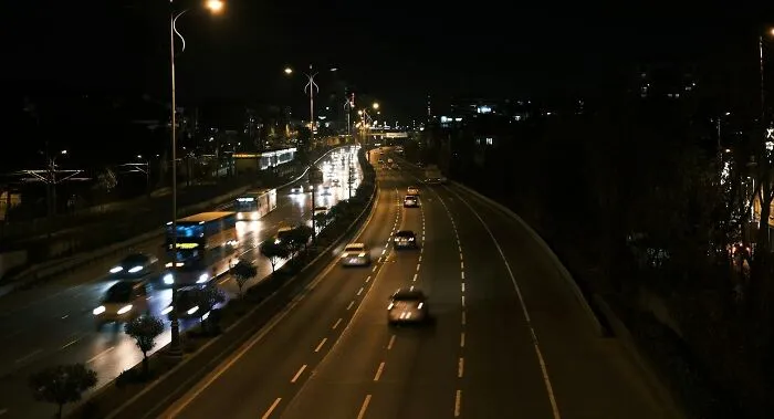 You are programming a self-driving car. Imagine there is another vehicle heading straight toward you, and a group of people standing to your right. Your only options are to collide with the oncoming car or swerve and hit the pedestrians. Do you program the car to swerve toward the other vehicle or toward the pedestrians?