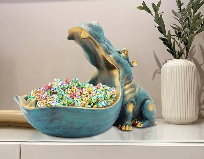 Your Candy Cravings Just Got A Quirky Sidekick, Because The <a Style="Display:inline;" Href="Https://Www.amazon.com/Hippopotamus-Figurine-Sculpture-Decoration-Container/Dp/B0932z1hrh?content-ID=amzn1.sym.7032aefd-3c59-4a1e-Aaf4-8d3a944207a4%3aamzn1.sym.7032aefd-3c59-4a1e-Aaf4-8d3a944207a4&crid=uyxr0ehj8j80&cv_ct_cx=fun%2bdecor&keywords=fun%2bdecor&pd_rd_i=b0932z1hrh&pd_rd_r=735aa4f6-D669-45f5-Bdfd-Eb334a0b9577&pd_rd_w=9w7jp&pd_rd_wg=jb4uq&pf_rd_p=7032aefd-3c59-4a1e-Aaf4-8d3a944207a4&pf_rd_r=j9q3x1w7j9wz9kx5kf79&qid=1740065219&sbo=rzvfv%2f%2fhxdf%2bo5021pansa%3d%3d&sprefix=fun%2b%2caps%2c218&sr=1-1-5190daf0-67e3-427c-Bea6-C72c1df98776&th=1&linkcode=ll1&tag=bpshark-20&linkid=a8d0dc9ebb4fcf1db7815d964e2ae59b&language=en_us&ref_=as_li_ss_tl" Target="_blank"><span Style="Font: Inherit; Color: #d74b1f;"> Hippo Candy Dish </Span> Is Here To Protect Your Sweets With Its Hilariously Hungry Expression