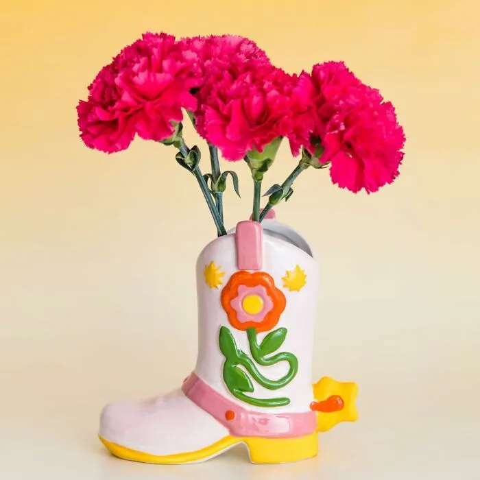 Giddy Up And Add Some Country Charm To Your Decor With This <a Style="Display:inline;" Href="Https://Www.amazon.com/Ban-Do-Cowboy-Colorful-Ceramic-Doubles/Dp/B0bqk7clhv?&linkcode=ll1&tag=bpostrich-20&linkid=1e7eb616b6310f46ada9a4f49bedaceb&language=en_us&ref_=as_li_ss_tl" Target="_blank"><span Style="Font: Inherit; Color: #d74b1f;"> Cowboy Boot Vase </Span> - A Rootin'-Tootin' Unique Way To Lasso Some Fresh Flowers Or Greens And Bring The Wild West To Your Living Room