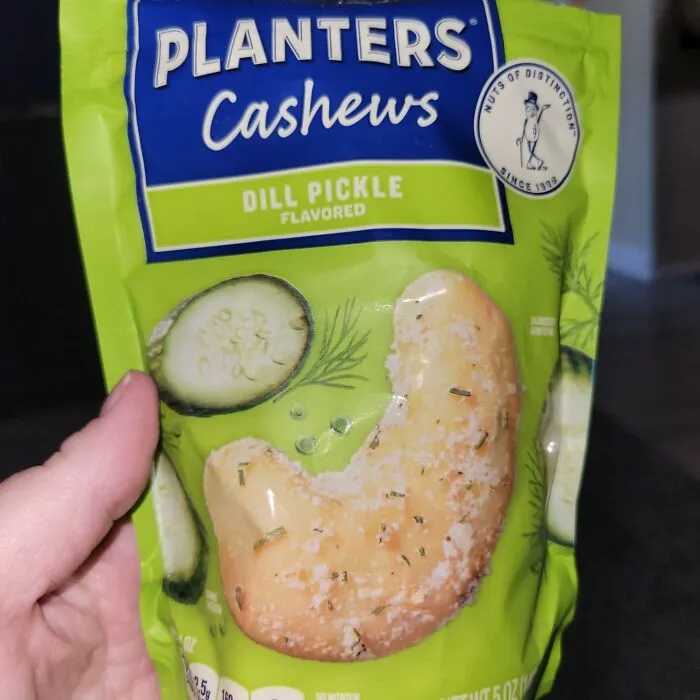 Your Taste Buds May Be Confused, But Your Snack Game Will Be Legendary With  <a Style="Display:inline;" Href="Https://Www.amazon.com/Planters-Cashews-Pickle-Flavored-Snacks/Dp/B0bsb15fkg?ie=utf8&th=1&linkcode=ll1&tag=bpdog-20&linkid=3ff478e4ae155cb61381bbd1aba36c3d&language=en_us&ref_=as_li_ss_tl" Target="_blank"><span Style="Font: Inherit; Color: #d74b1f;"> Dill Pickle Cashews</Span>