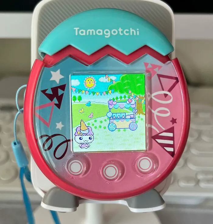 Be The Cool Aunt Or Uncle Who Brings Back The ‘90s With This  <a Style="Display:inline;" Href="Https://Www.amazon.com/Tamagotchi-Pix-Floral-Pink-42901/Dp/B08xwkgq9h?ie=utf8&th=1&linkcode=ll1&tag=bpbanana-20&linkid=dd27d6d1f0b2dc73f4787ca83cd40ce4&language=en_us&ref_=as_li_ss_tl" Target="_blank"><span Style="Font: Inherit; Color: #d74b1f;"> Tamagotchi </Span>
