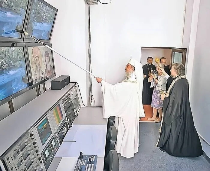 Priests And Monks Blessing Server Rooms And Sprinkling Holy Water On Computer Systems As A Way To Prevent Them From Ever Shutting Down