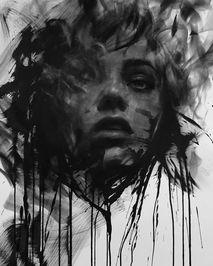 Charcoal portrait with abstract strokes creating a striking image by artist Josh Hernandez.