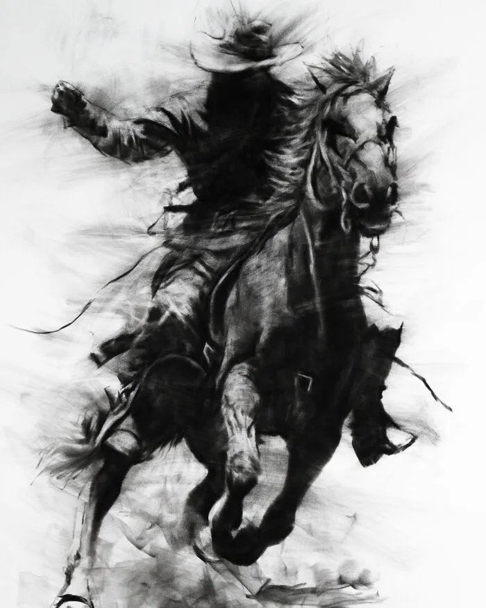 Charcoal portrait of a rider on horseback, showcasing dynamic movement and contrast.