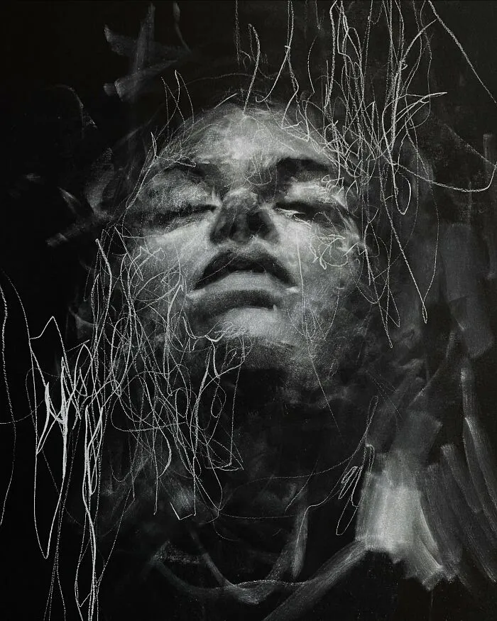 Charcoal portrait by artist Josh Hernandez, featuring abstract linework over a serene face.