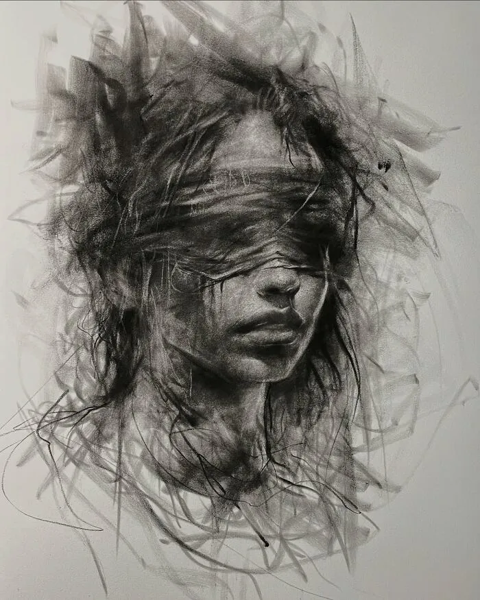 Charcoal portrait by Josh Hernandez, featuring a blurred face with dynamic lines creating a mysterious effect.