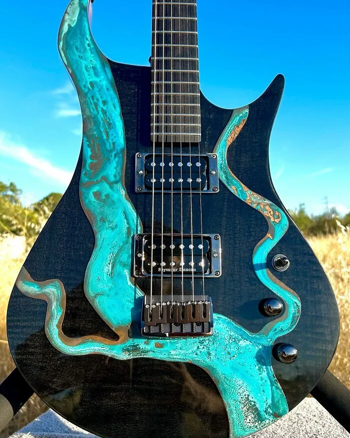 Burls Art Crafted 28 Extraordinary Guitars Using Unconventional Materials